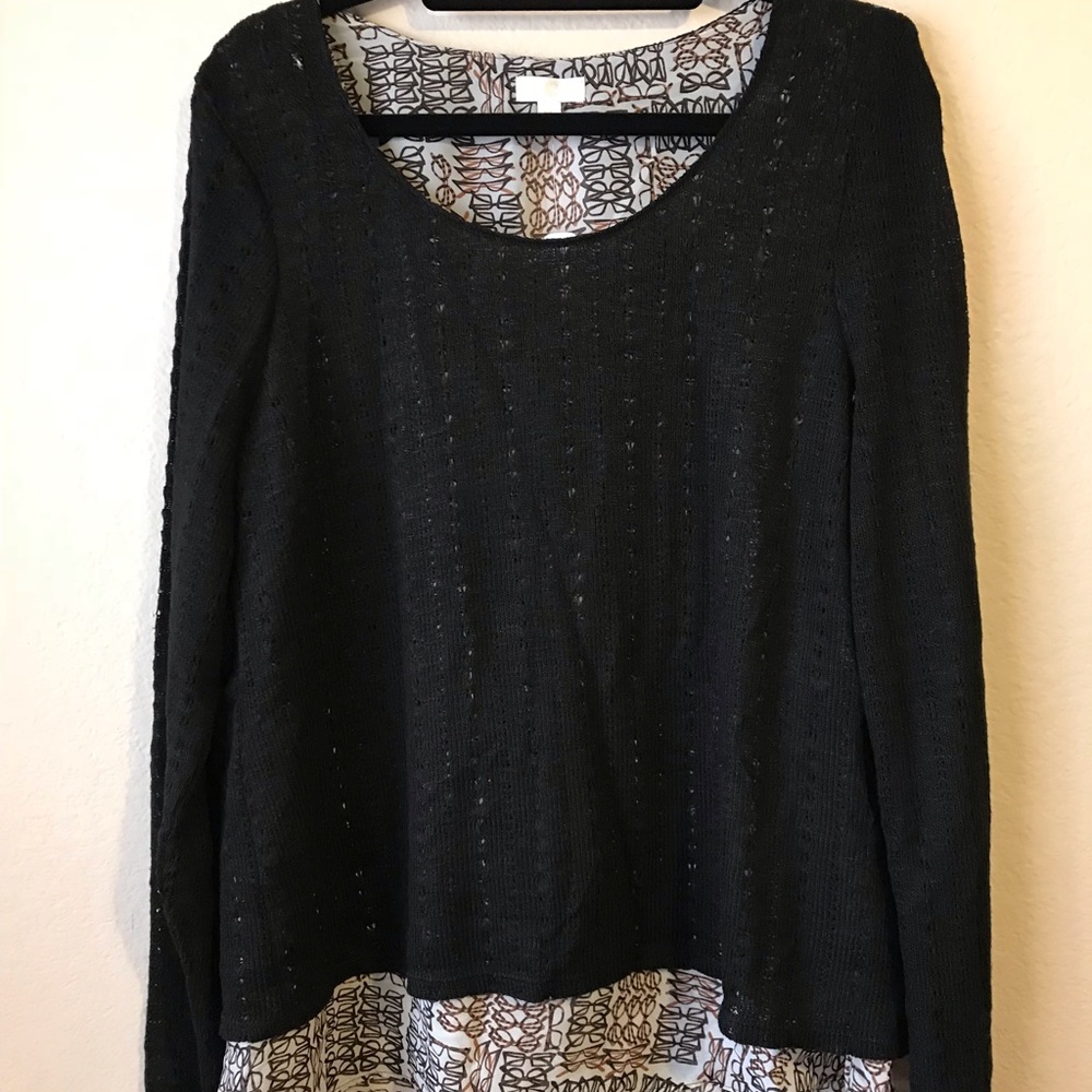 Black sweater with glasses-pattern insert